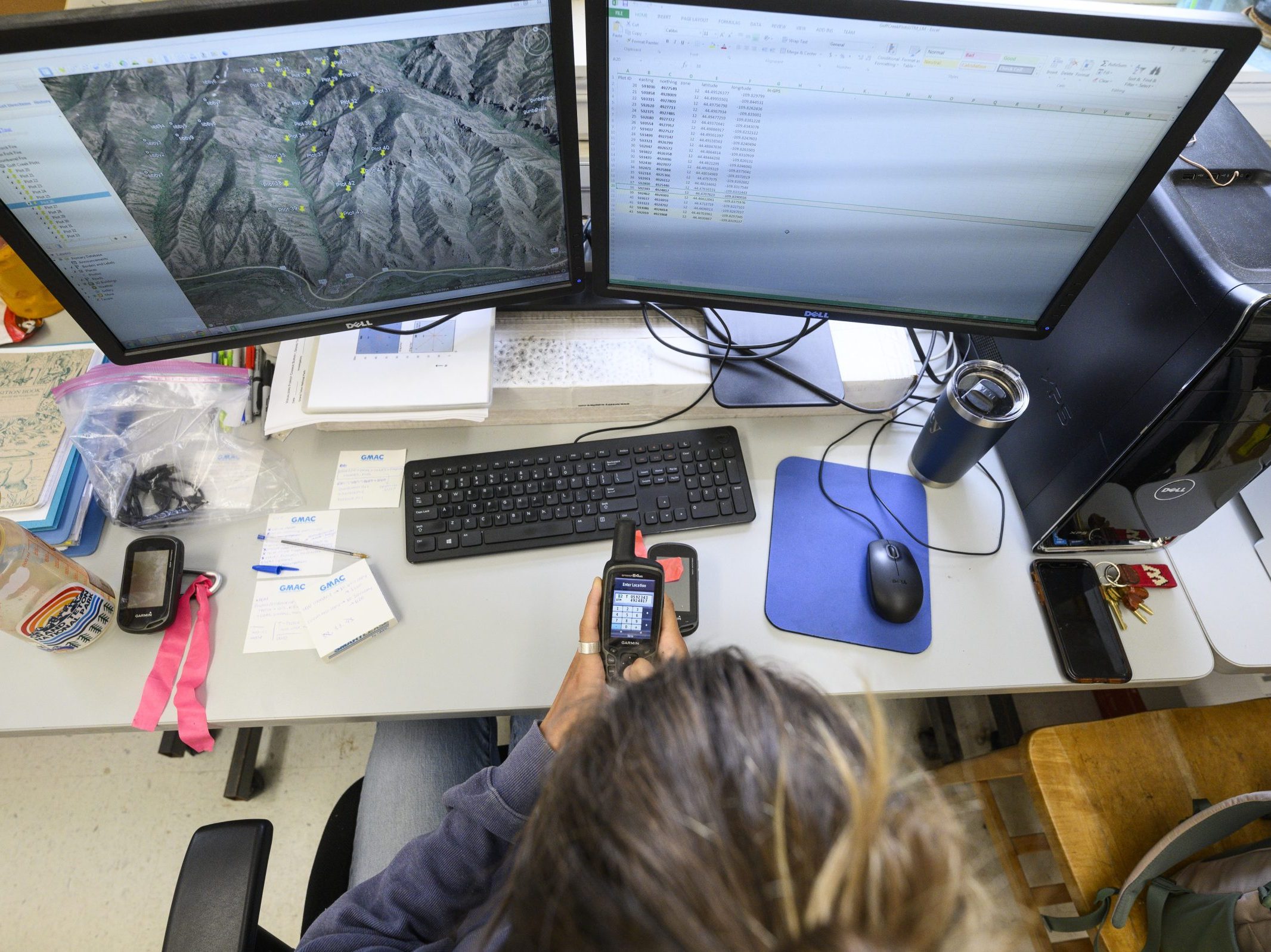 Computer with a landscape map on the screen.